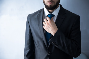 man hand in tie