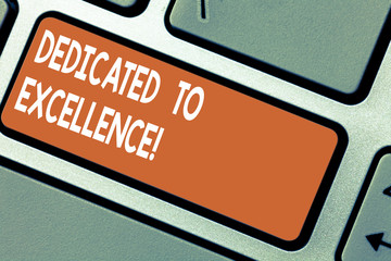 Word writing text Dedicated To Excellence. Business concept for a pledge or promise to do something exceptionally Keyboard key Intention to create computer message pressing keypad idea