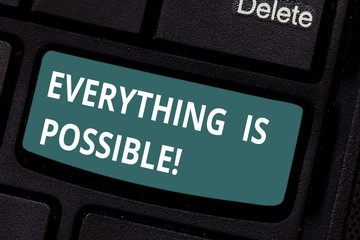 Naklejka premium Text sign showing Everything Is Possible. Conceptual photo we cannot predict with any certainty what will happen Keyboard key Intention to create computer message pressing keypad idea