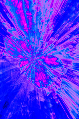 Creative abstract background reminding of a burst full of dynamics in purple, blue, magenta, violet ect.