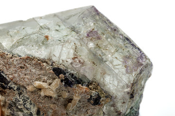Macro of a mineral stone Fluorite on a white background