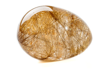 Macro mineral quartz hairy stone, quartz with rutile on a white background