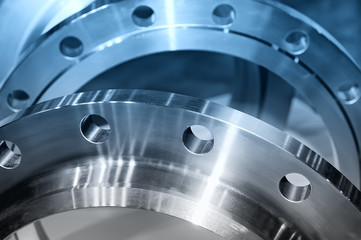 Ring-shaped industrial steel details. Blue toned image