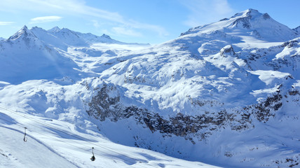 Skiing, snowboarding slopes, off piste trails, in French resort of Tignes, Alps , on a winter day, ...