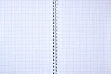 open notebook in a cell with white sheets