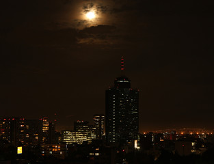  Dramatic night of the blue blood moon in Mexico City with clouds