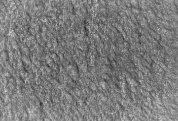 rough fleecy fabric with fiber and wool, close-up.