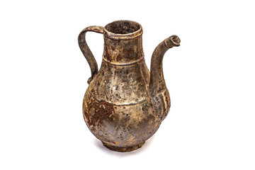 Beautiful vintage cast iron jug on white isolated background