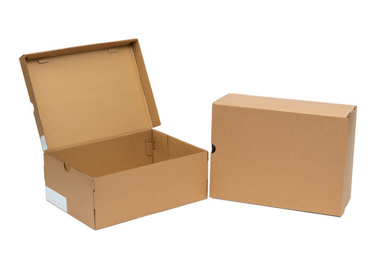 Brown cardboard shoes box with lid for shoe or sneaker product packaging mockup, isolated on white with clipping path.