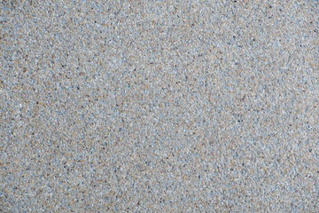 Explsed aggregate finish concrete wall and floor background texture.