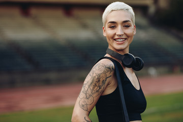 Portrait of a smiling female runner