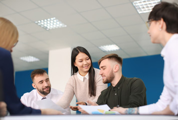 Office employees having meeting in conference room. Finance trading