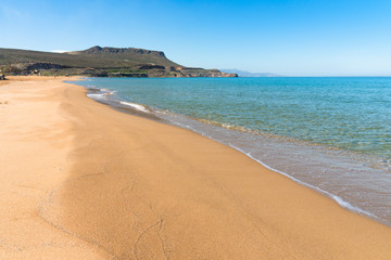 Fototapeta na wymiar Panoramic view of long sand beach at Arina Sand coast Heraklion Crete Greece. Turquoise water, blue sky mediterranean tropical destination. Travel holiday concept.