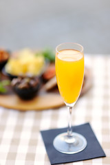 Italian aperitives/aperitif: glass of cocktail (sparkling wine with Aperol) and appetizer platter...