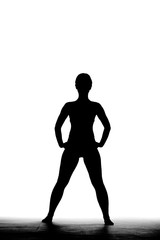 full body silhouette shot of a beautiful girl standing and posing