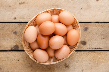 Chicken eggs in the basket.