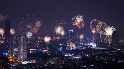 night cityscape firework along with river for festival
