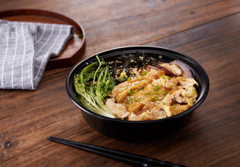 Delicious Chinese cuisine, chicken chop rice takeaway meal