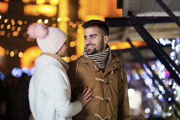 Obraz premium Happy young couple in winter