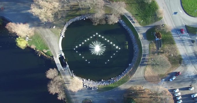 Aerial still view, top down view of small pond with fountain in Lahti, Finland, "Pieni vesij&radic;&sect;rvi"
