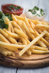 French fries with ketchup and mayonnaise