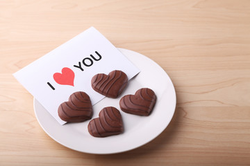 Heart shaped chocolate cookies on a dish