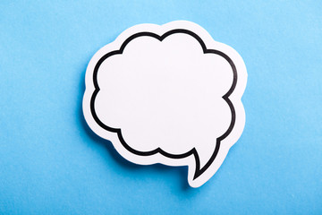 Blank Speech Bubble Isolated On Blue