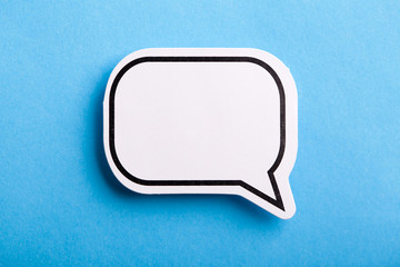 Blank Speech Bubble Isolated On Blue