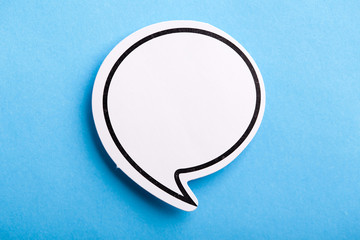 Blank Speech Bubble Isolated On Blue