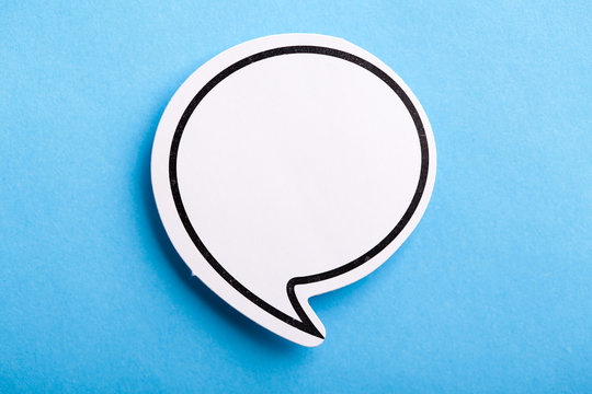 Blank Speech Bubble Isolated On Blue