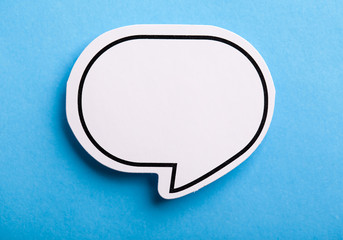 Blank Speech Bubble Isolated On Blue