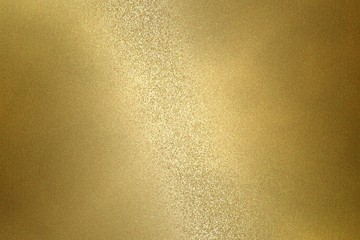 Reflection on rough gold metallic plate surfaces, abstract texture background