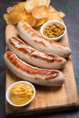 German sausages with mostard and fried potato