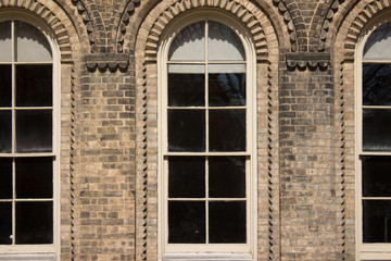 Arched Windows in a Brick Wall