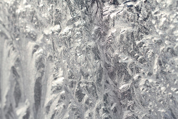 white frost on glass of abstract textures