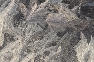 white frost on glass of abstract textures