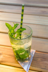 mojito cocktail on a wooden table