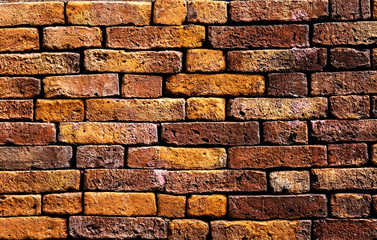 The background of the old red brick wall surface is strong, resistant to rain and sun.