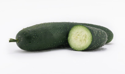  Fresh Cucumber Sliced on white background with water drops