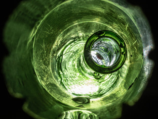 Looking Down a Tunnel at Vibrant Wet Bottle