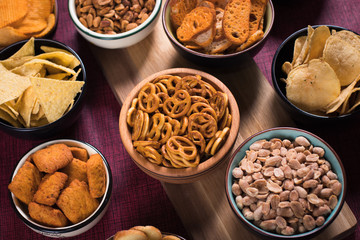 Salty snacks served in bowls