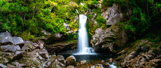 Beautiful waterfalls in the green nature, Wainui Falls, Abel Tasman, New Zealand.