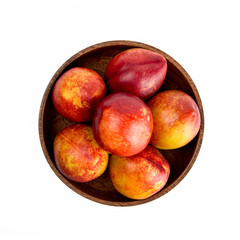 Fresh nectarine isolated on white background.