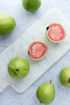 Fresh ripe guava on marble background