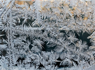 beautiful frosty patterns on glass