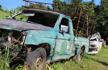 Closeup front side of wreckage  car parking in junkyard.