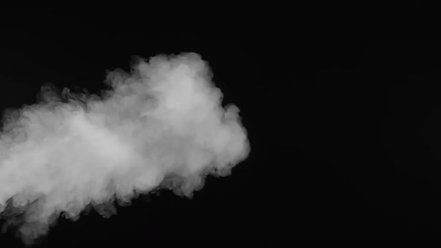 White smoke on black background in slow motion.