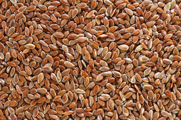 Brown flax seed full background.