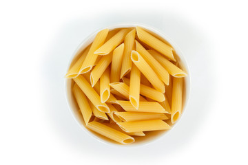 dry pasta penne Italian food in a bowl on white background.