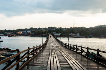 Fototapeta na wymiar Landscape of Mon Wooden Bridge in Kanchanaburi Thailand